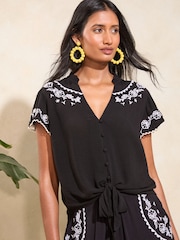 Love & Roses Black Embroidered Petite Embroidered Short Sleeve Tie Detail Shell Top - Image 1 of 4