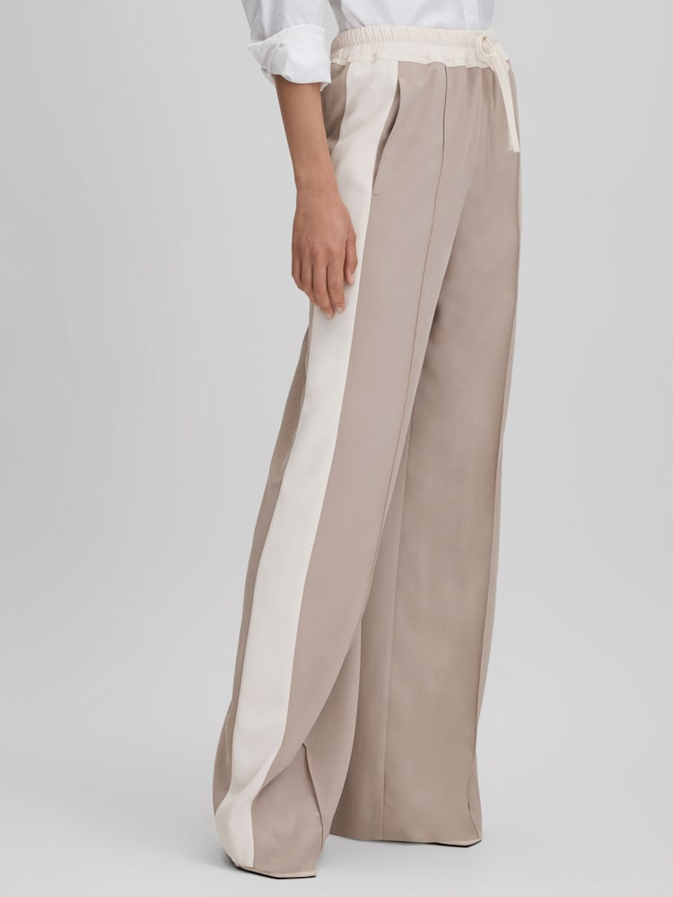 Reiss Mink Neutral May Wide Wide Leg Contrast Stripe Drawstring Trousers - Image 1 of 6 Reiss Mink Neutral May Wide Wide Leg Contrast Stripe Drawstring Trousers - Image 1 of 6