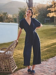 Navy Blue Plisse Short Sleeve V-Neck Culotte Belted Jumpsuit - Image 1 of 6