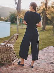 Navy Blue Plisse Short Sleeve V-Neck Culotte Belted Jumpsuit - Image 2 of 6