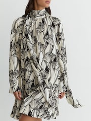 Reiss Black/Ivory Alwen Floral-Print Tie-Neck Swing Mini Dress - Image 1 of 7