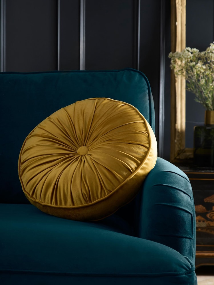 Laurence Llewelyn-Bowen Ochre Roxy Round Pleat Velvet Round Cushion - Image 1 of 4 Laurence Llewelyn-Bowen Ochre Roxy Round Pleat Velvet Round Cushion - Image 1 of 4