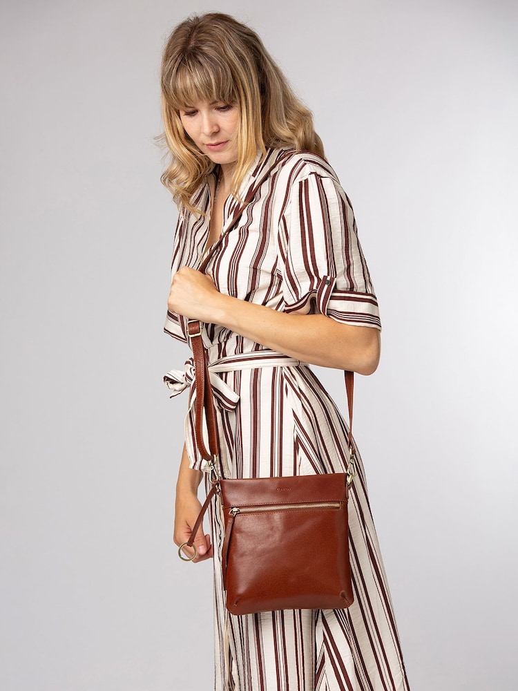 Conkca Brown 'Dove' Leather Cross-Body Bag - Image 1 of 6 Conkca Brown 'Dove' Leather Cross-Body Bag - Image 1 of 6