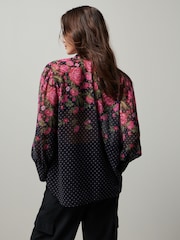 Schwarz - Langärmelige Bluse mit Blumen und Punkten​​​​​​​ - Bild 3 von 6