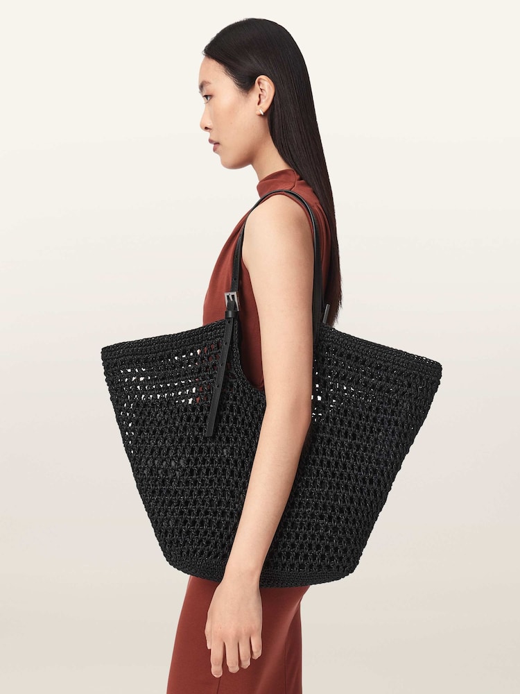 AllSaints Black Ara Cotton Knit East/West Tote Bag - Image 1 of 7 AllSaints Black Ara Cotton Knit East/West Tote Bag - Image 1 of 7