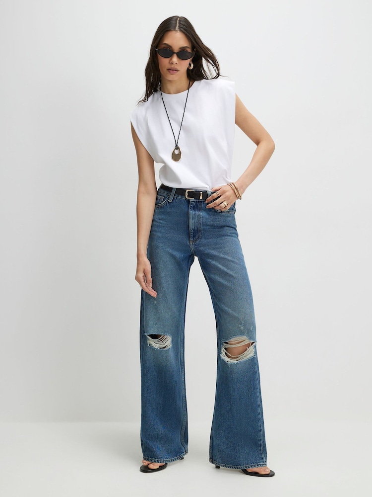 River Island Blue High Rise Ripped Relaxed Straight Jeans - Image 2 of 4 River Island Blue High Rise Ripped Relaxed Straight Jeans - Image 2 of 4