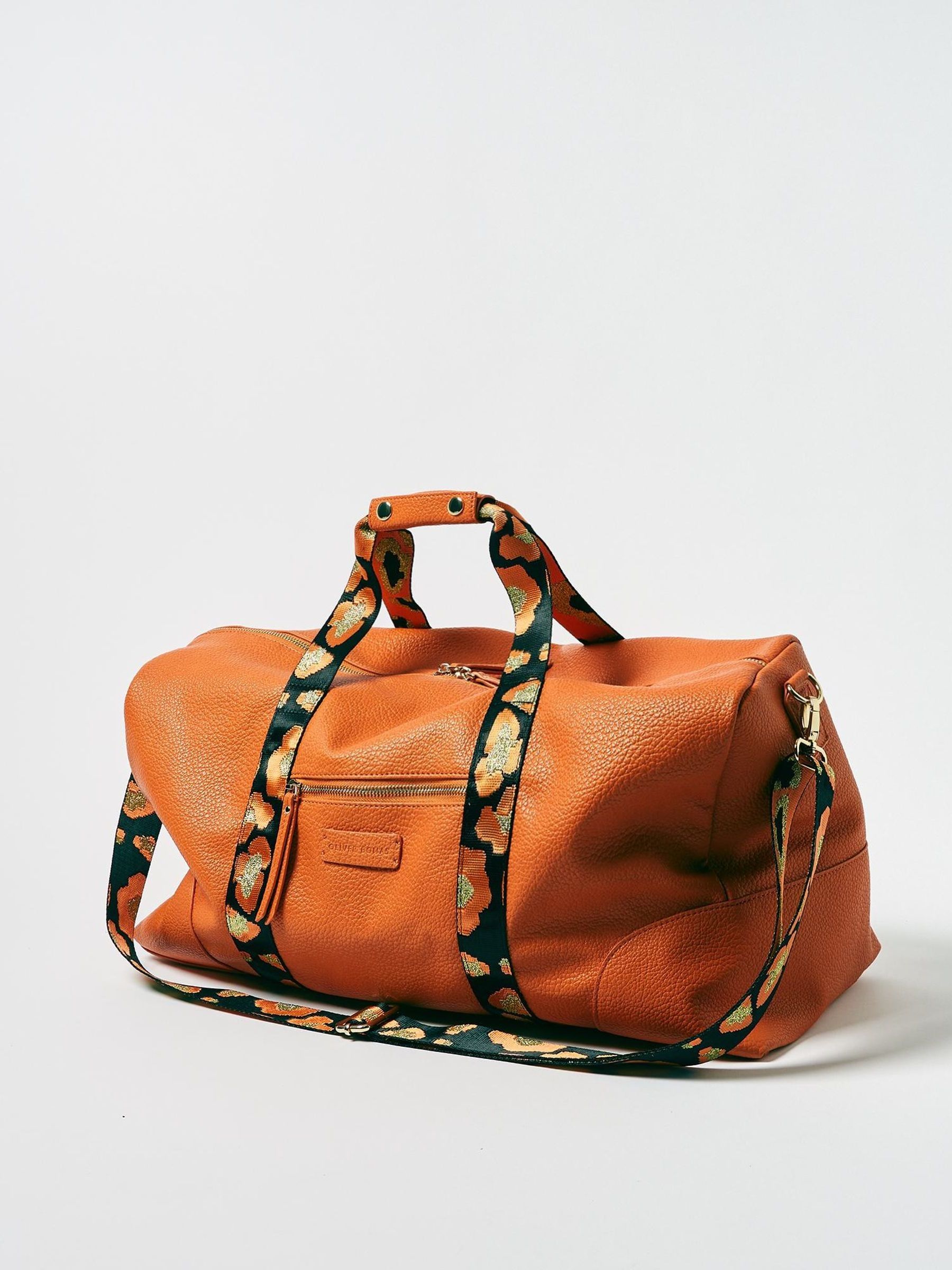 Buy Oliver Bonas Orange Hattie Animal Print Weekend Bag from Next USA