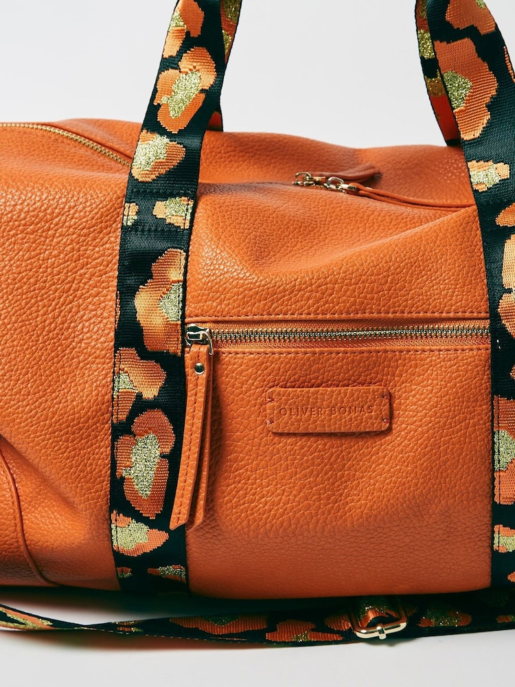 Buy Oliver Bonas Orange Hattie Animal Print Weekend Bag from Next USA
