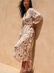 Vestido a media pierna con estampado de cebra y nudo delantero de Roman - Imagen 2 de 4