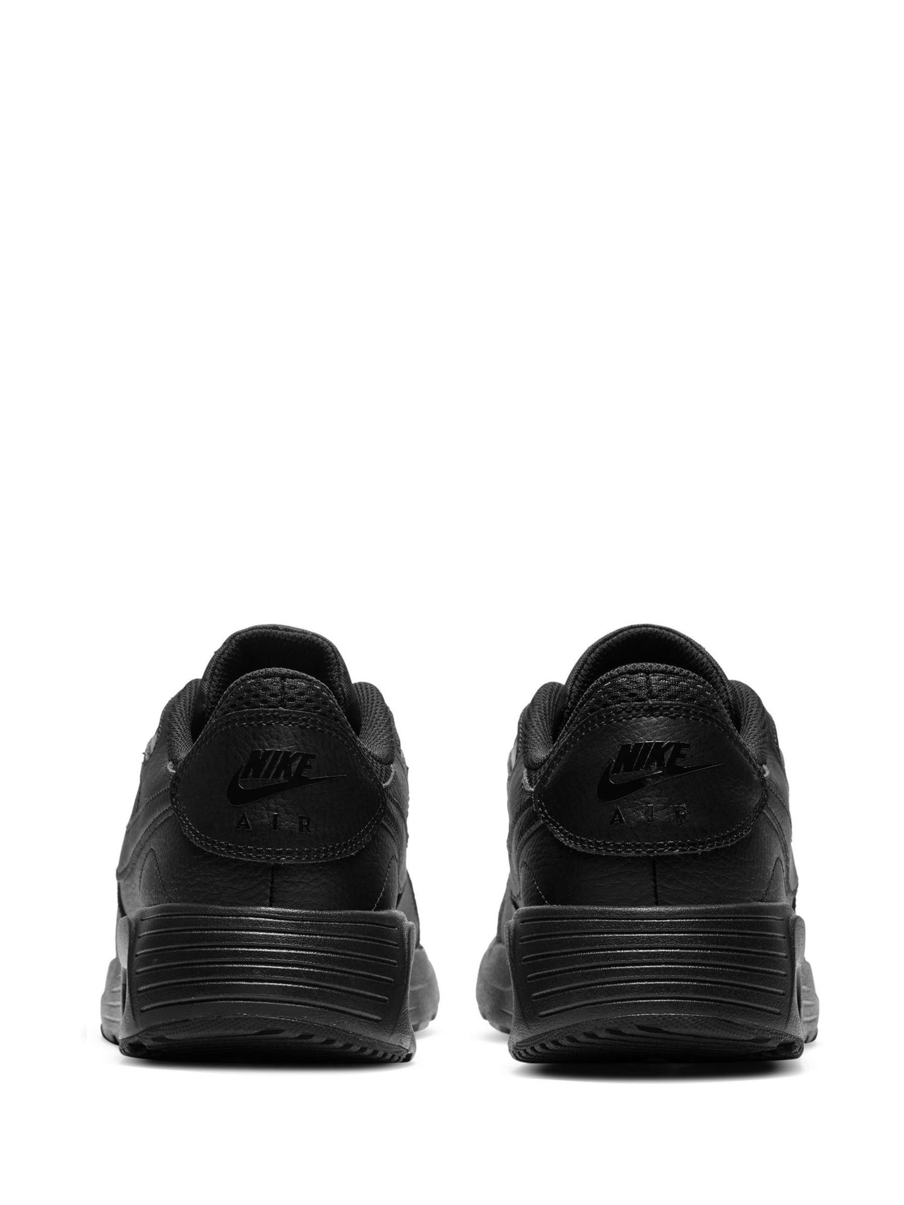 black nike soft trainers