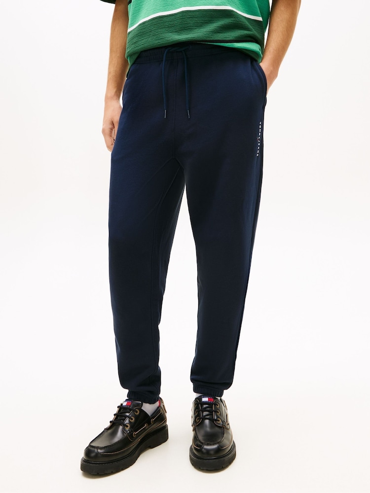 Tommy Hilfiger Blue Linear Logo Fleece Drawstring Joggers - Image 1 of 5 Tommy Hilfiger Blue Linear Logo Fleece Drawstring Joggers - Image 1 of 5