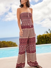 Burgunderrot mit Holzschnittmuster - Gesmokter Bandeau-Overall - Bild 1 von 6