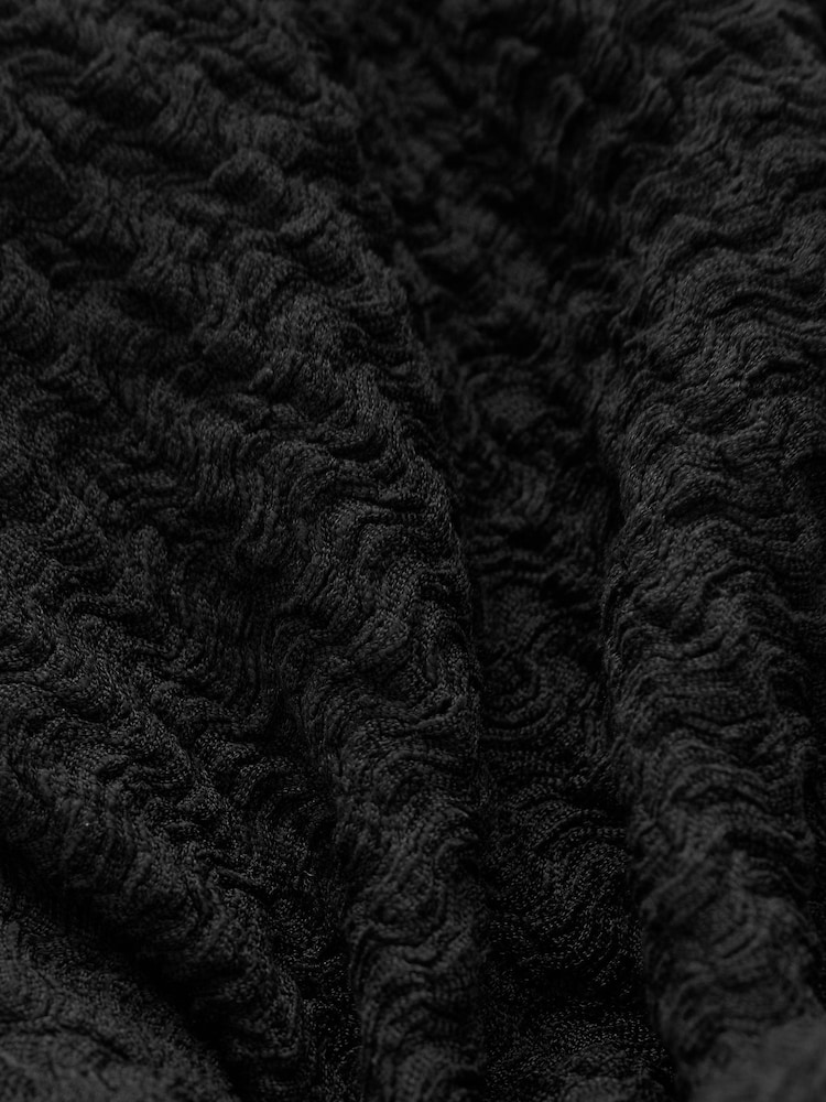 Schwarz - Texturiertes Bardot-Top mit Twist Front - Bild 5 von 5 Schwarz - Texturiertes Bardot-Top mit Twist Front - Bild 5 von 5
