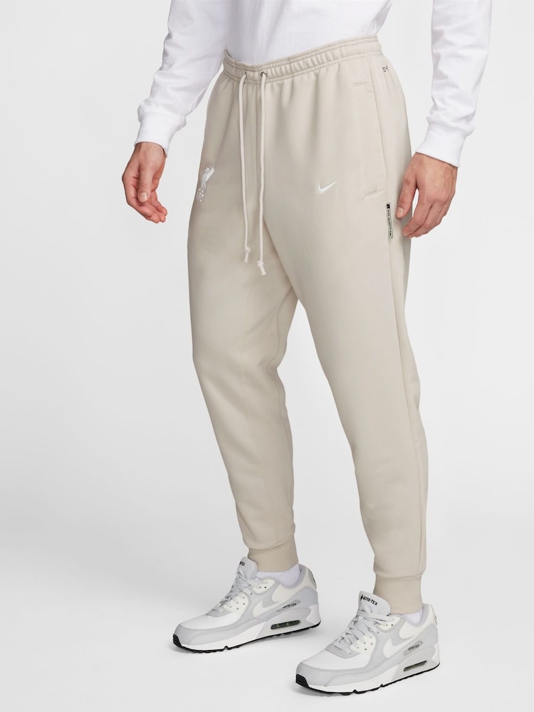 Nike Cream Liverpool FC Tapered Joggers - Image 1 of 3