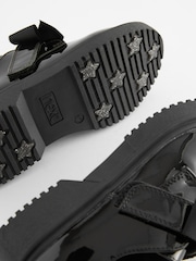 Schwarzes Lackleder - Schuhe mit Klettverschluss und Schleife - Bild 5 von 5