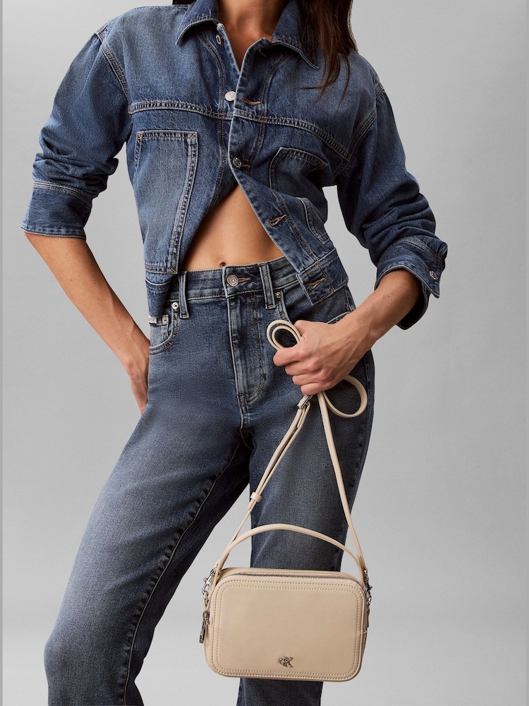 Calvin Klein White Monogram Logo Cross-Body Camera Bag - Image 1 of 4 Calvin Klein White Monogram Logo Cross-Body Camera Bag - Image 1 of 4