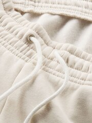 Nike Cream Phoenix Fleece Mid-Rise Logo Joggers - Image 9 of 9