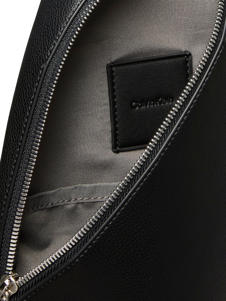 Calvin Klein Black Micro Pebble Sling Bag - Image 4 of 4 Calvin Klein Black Micro Pebble Sling Bag - Image 4 of 4