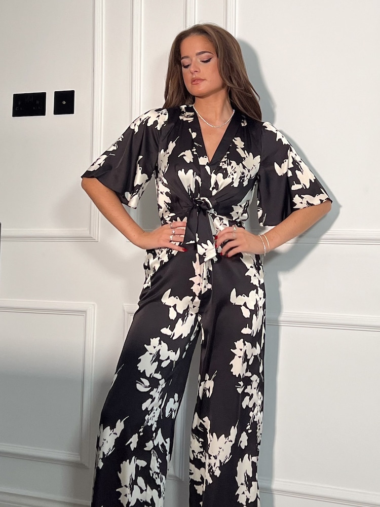 Girl In Mind Black White Floral Viola Wrap Tie Detail Wide Leg Jumpsuit - Image 1 of 4
