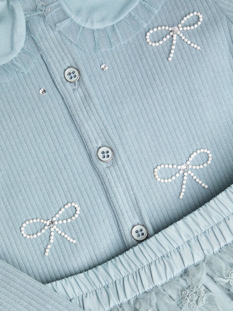 Monsoon Blue Pearl Bow Top & Appliqué Mesh Skirt Set - Image 2 of 2 Monsoon Blue Pearl Bow Top & Appliqué Mesh Skirt Set - Image 2 of 2