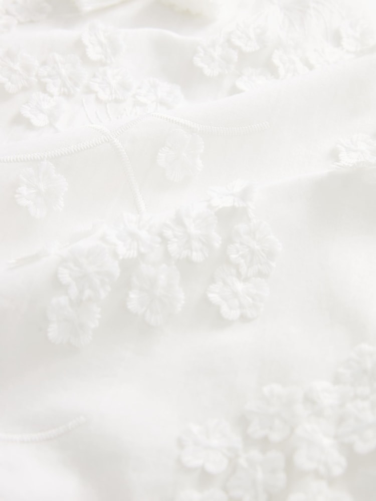 Weiß - Bluse mit Schluppe und Blumenmuste - Bild 6 von 6