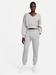 Gris oscuro jaspeado - Pantalones deportivos de polar de tiro medio Phoenix de Nike - Imagen 4 de 9