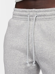 Gris oscuro jaspeado - Pantalones deportivos de polar de tiro medio Phoenix de Nike - Imagen 7 de 9