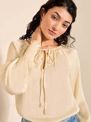 Friends Like These Champagne Gold Tie Neck Long Sleeve Blouse - Image 1 of 4