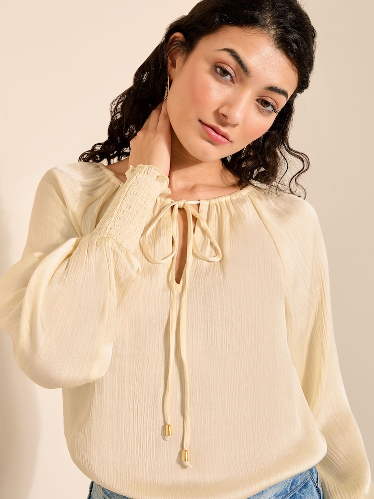 Friends Like These Champagne Gold Tie Neck Long Sleeve Blouse - Image 1 of 4