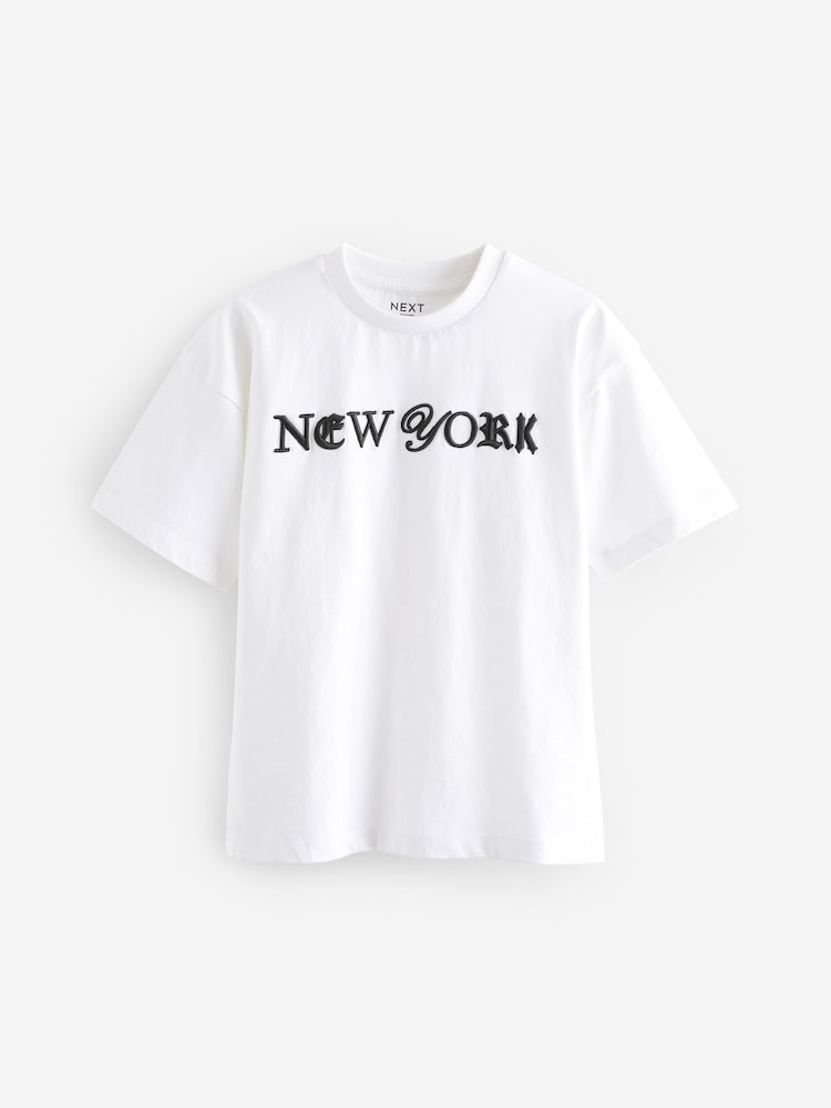Белый с надписью "New York" - Футболка свободного кроя с короткими рукавами и принтом (3-16лет) - Изображение 1 из 3