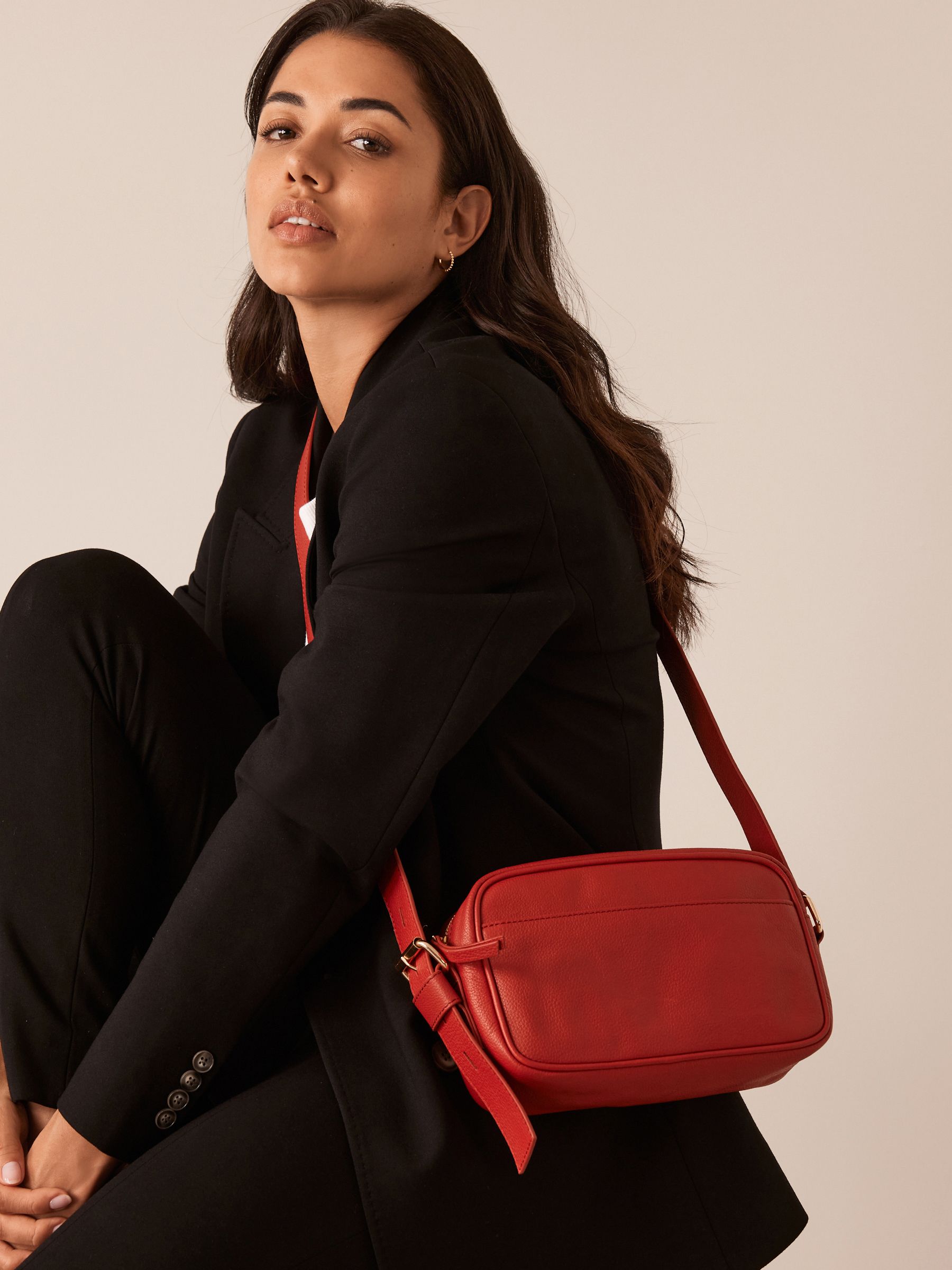 Red leather camera bag on sale