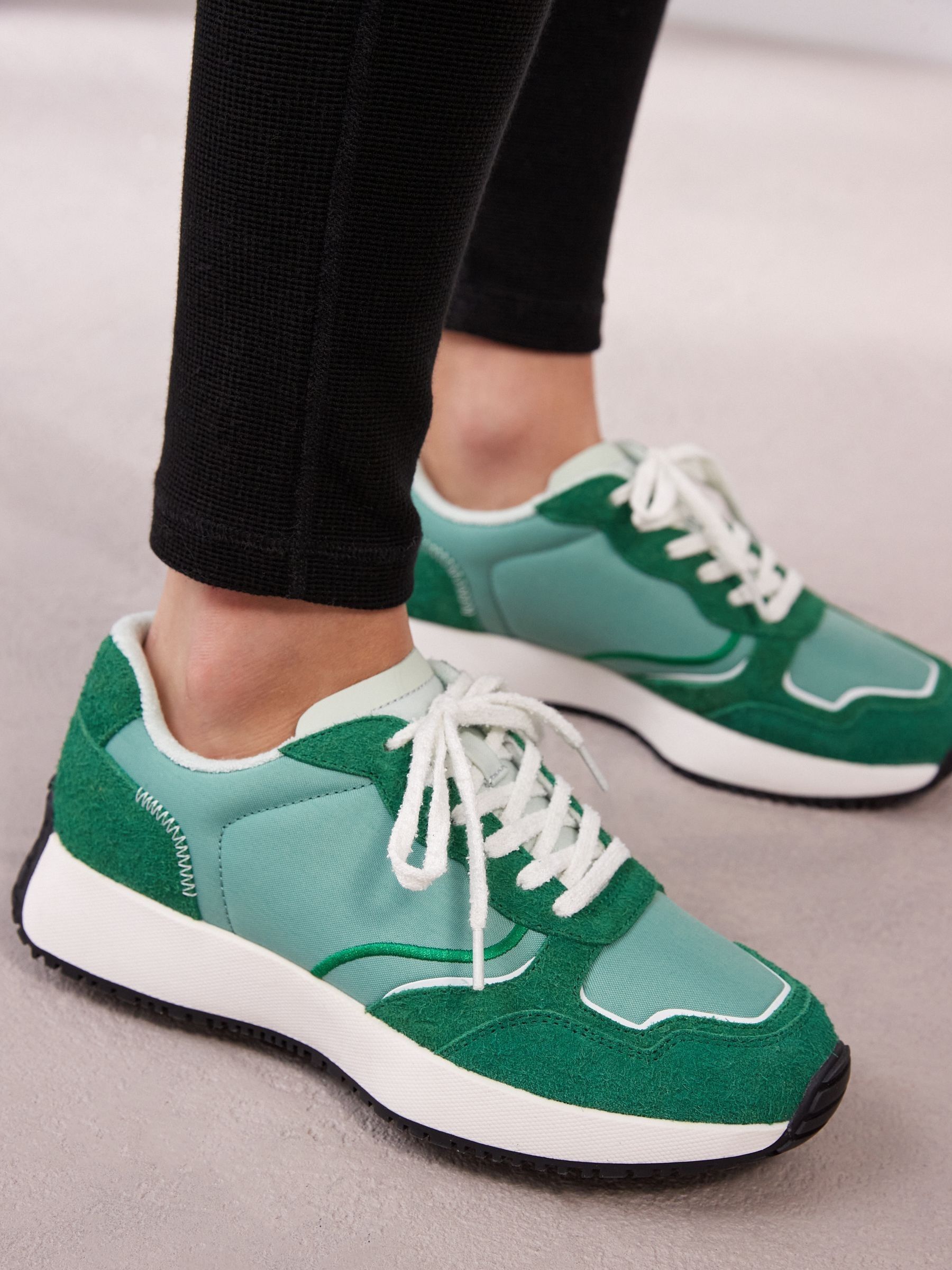 Green chunky trainers store