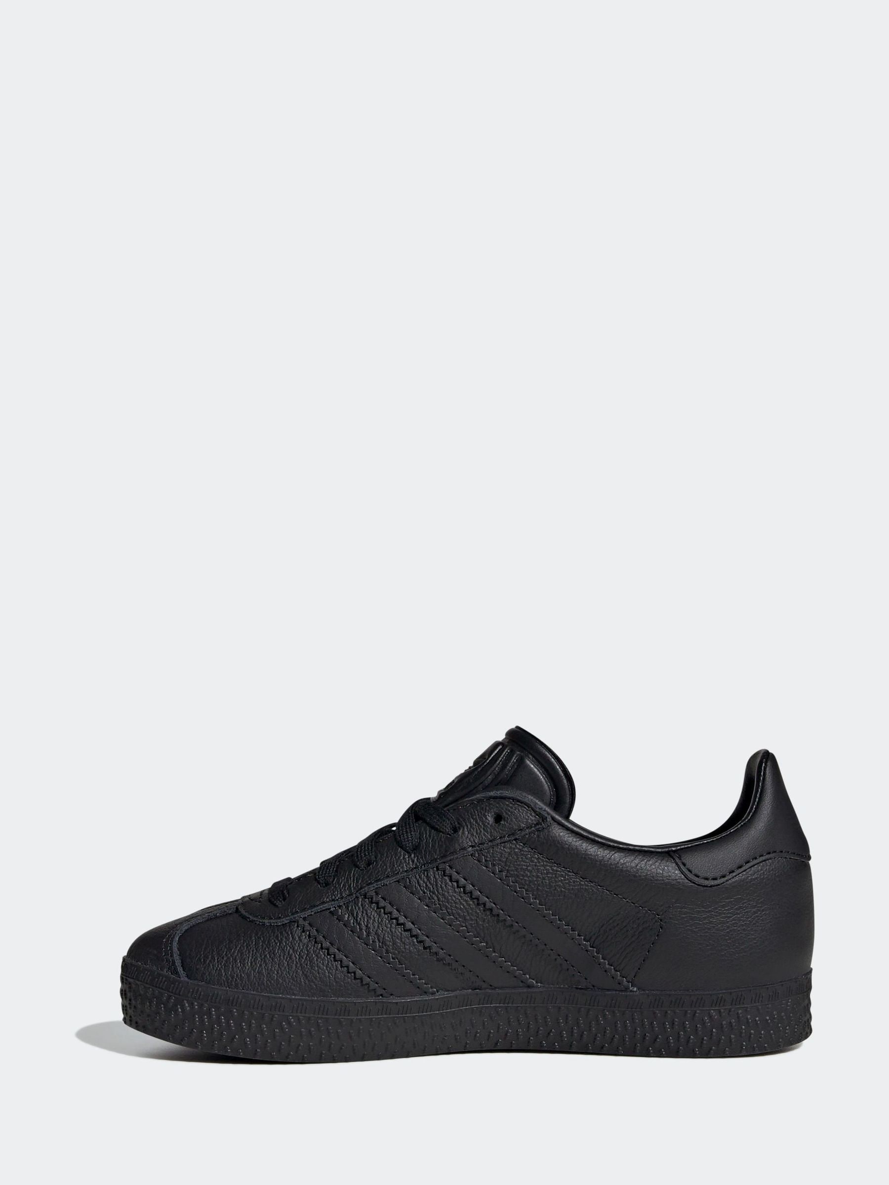 Buy adidas Originals Dark Black Gazelle Junior Trainers from Next USA