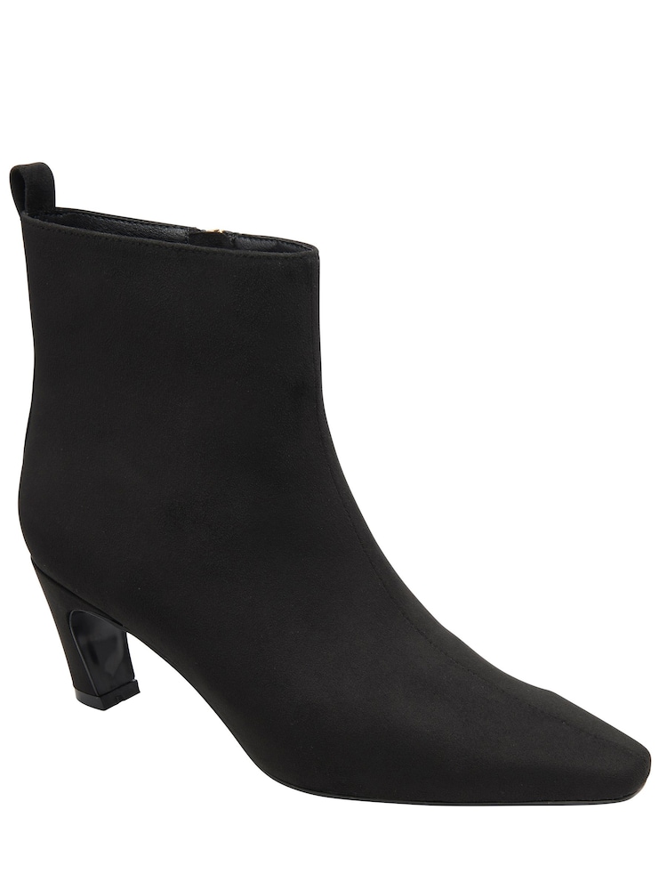 Ravel Black Chisel Toe Faux Suede Chelsea Ankle Boots With A Shaped Heel - Image 1 of 4 Ravel Black Chisel Toe Faux Suede Chelsea Ankle Boots With A Shaped Heel - Image 1 of 4