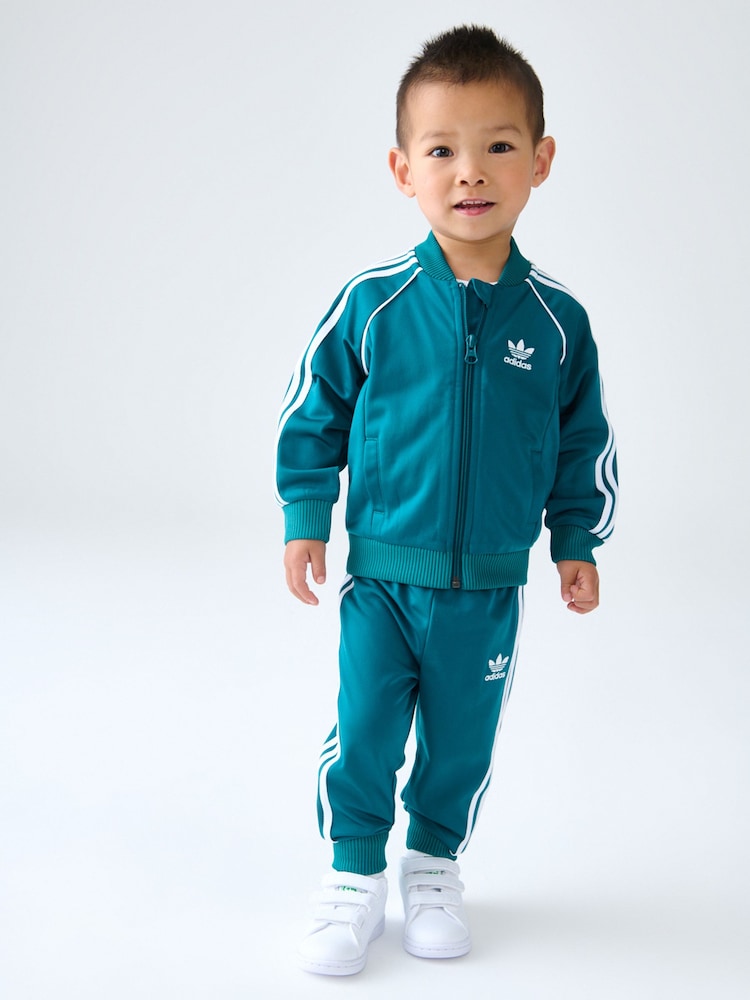 adidas Originals Kinder Adicolor SST Trainingsanzug - Bild 1 von 9 adidas Originals Kinder Adicolor SST Trainingsanzug - Bild 1 von 9