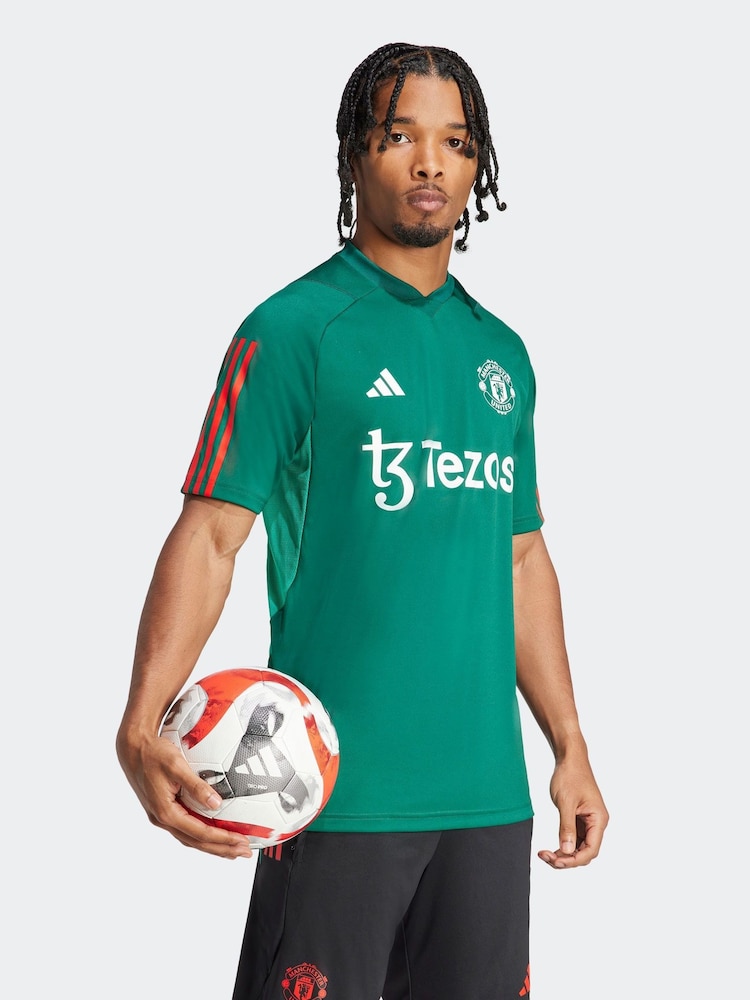 adidas Green Manchester United Tiro 23 Training Jersey - Image 1 of 7 adidas Green Manchester United Tiro 23 Training Jersey - Image 1 of 7