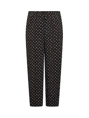 Pantalones de pernera ancha con estampado de lunares de Yours Curve - Imagen 5 de 6