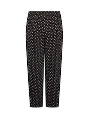 Pantalones de pernera ancha con estampado de lunares de Yours Curve - Imagen 6 de 6