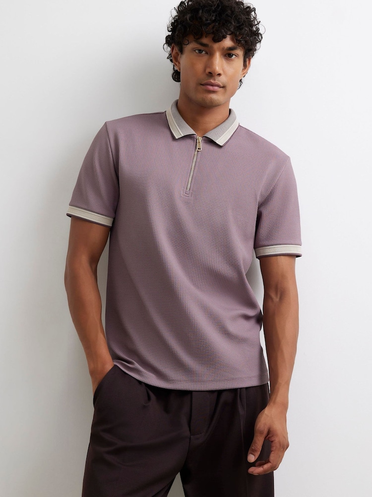 Lila - River Island Poloshirt mit Waffelstruktur und Reißverschluss in Slim-Fit - Bild 1 von 4 Lila - River Island Poloshirt mit Waffelstruktur und Reißverschluss in Slim-Fit - Bild 1 von 4