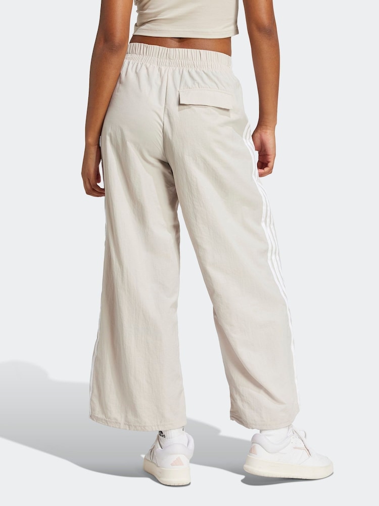 adidas Cream Essentials 3-Stripes Lifestyle Woven Parachute Tracksuit Bottoms - Image 2 of 6 adidas Cream Essentials 3-Stripes Lifestyle Woven Parachute Tracksuit Bottoms - Image 2 of 6