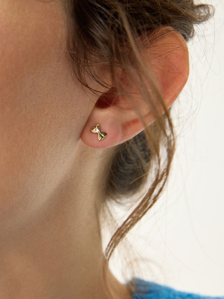 Oliver Bonas Gold Farfalle Pasta Bow Gold Plated Stud Earrings - Image 4 of 4 Oliver Bonas Gold Farfalle Pasta Bow Gold Plated Stud Earrings - Image 4 of 4