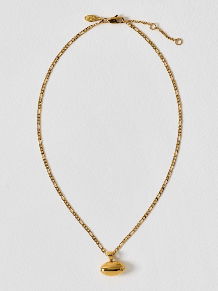 Oliver Bonas Gold Tone Tara Waterproof Oval Pendant Necklace - Image 1 of 4 Oliver Bonas Gold Tone Tara Waterproof Oval Pendant Necklace - Image 1 of 4