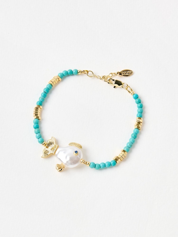 Oliver Bonas Blue Fiona Fish Faux Pearl Beaded Bracelet - Image 1 of 4 Oliver Bonas Blue Fiona Fish Faux Pearl Beaded Bracelet - Image 1 of 4