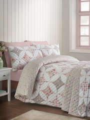 Catherine Lansfield Green Pinsonic Patchwork Reversible Duvet Cover and Pillowcase Set - Image 1 of 5