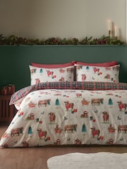 Catherine Lansfield – wendbares Bettbezug- und Kissenbezug-Set mit Weihnachts-Hochlandrind-Motiv - Bild 2 von 5