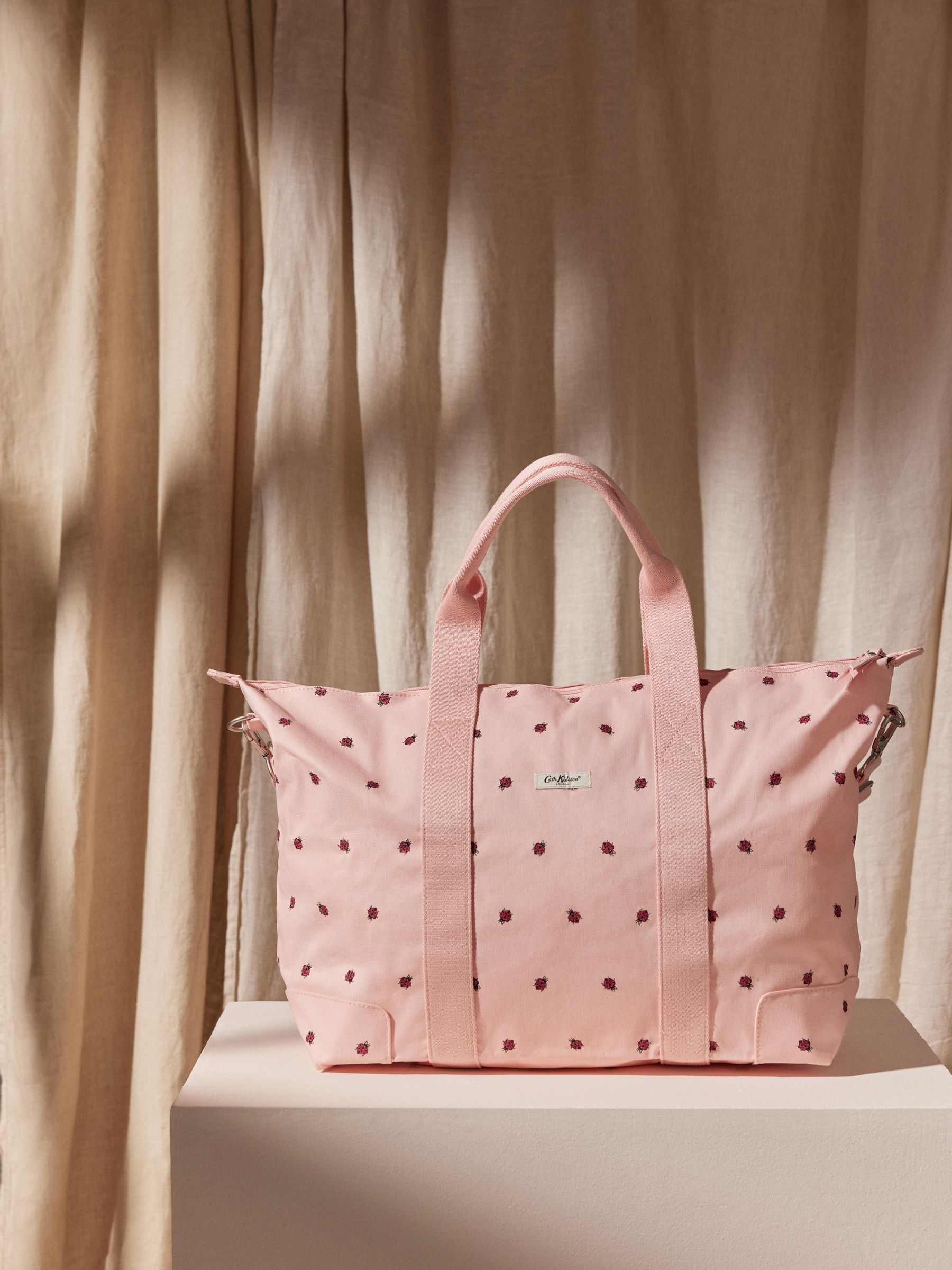 Pink overnight bags top