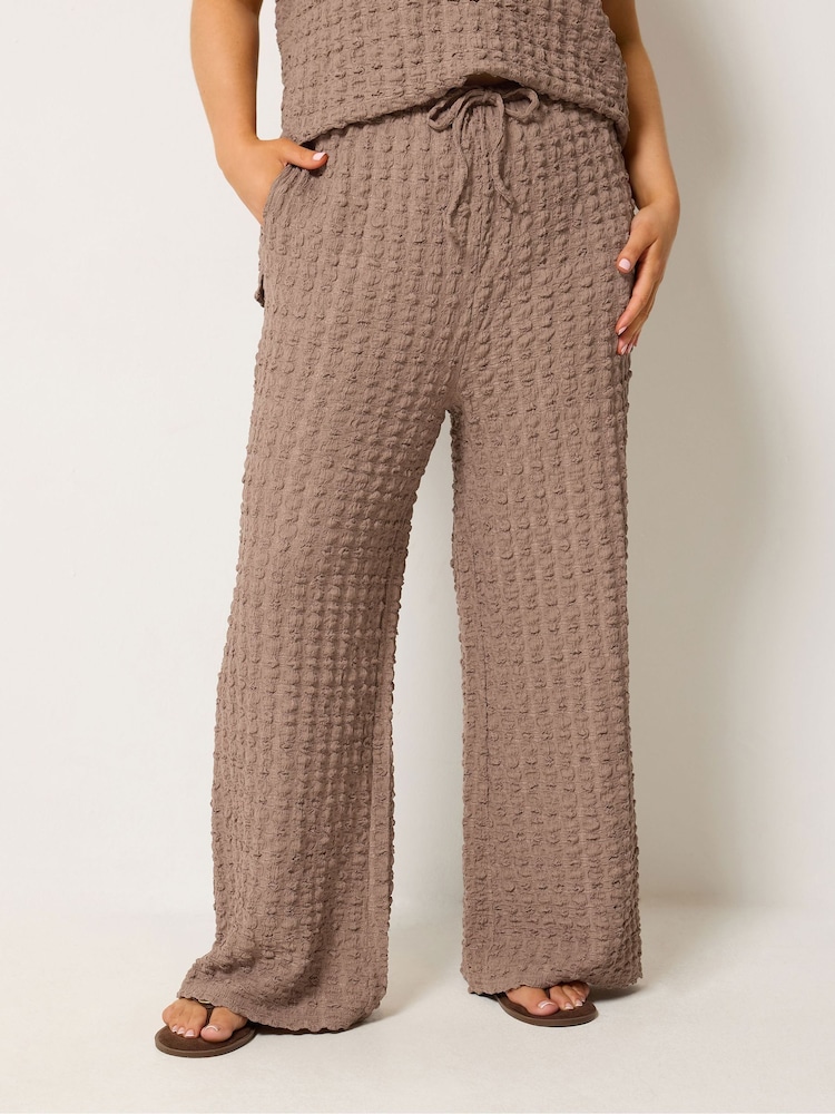 Yours Curve Brown Bubble Textured Wide Leg Trousers - Image 1 of 5 Yours Curve Brown Bubble Textured Wide Leg Trousers - Image 1 of 5