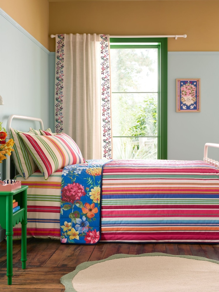 Sophie Robinson Bright Darling Floral Stripe Reversible Bedspread - Image 1 of 4 Sophie Robinson Bright Darling Floral Stripe Reversible Bedspread - Image 1 of 4