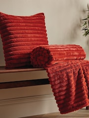 Catherine Lansfield Orange Catherine Lansfield Soft and Cosy Ribbed Cushion - Image 1 of 4