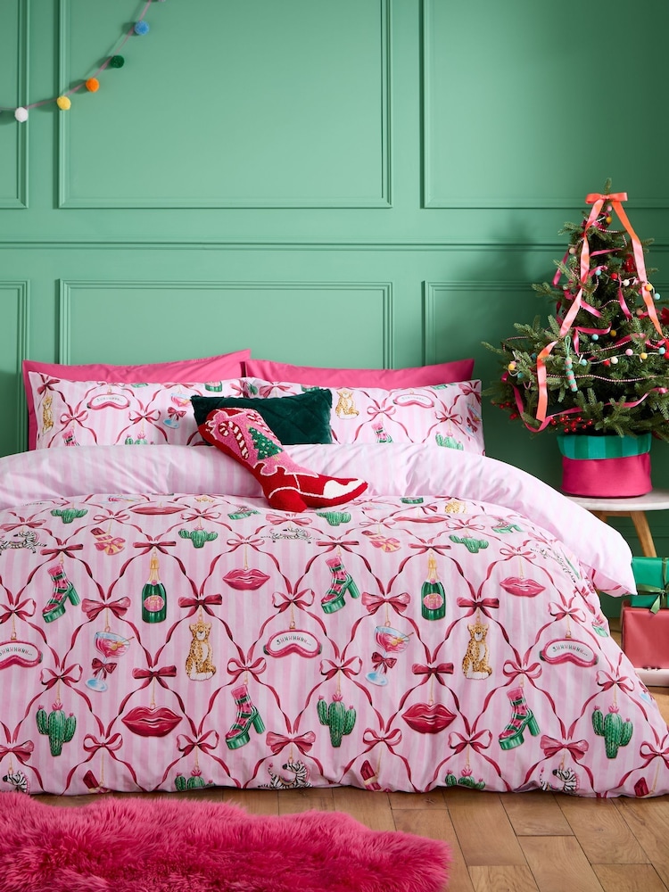 Catherine Lansfield Pink Christmas Kitsch Reversible Duvet Cover and Pillowcase Set - Image 1 of 5